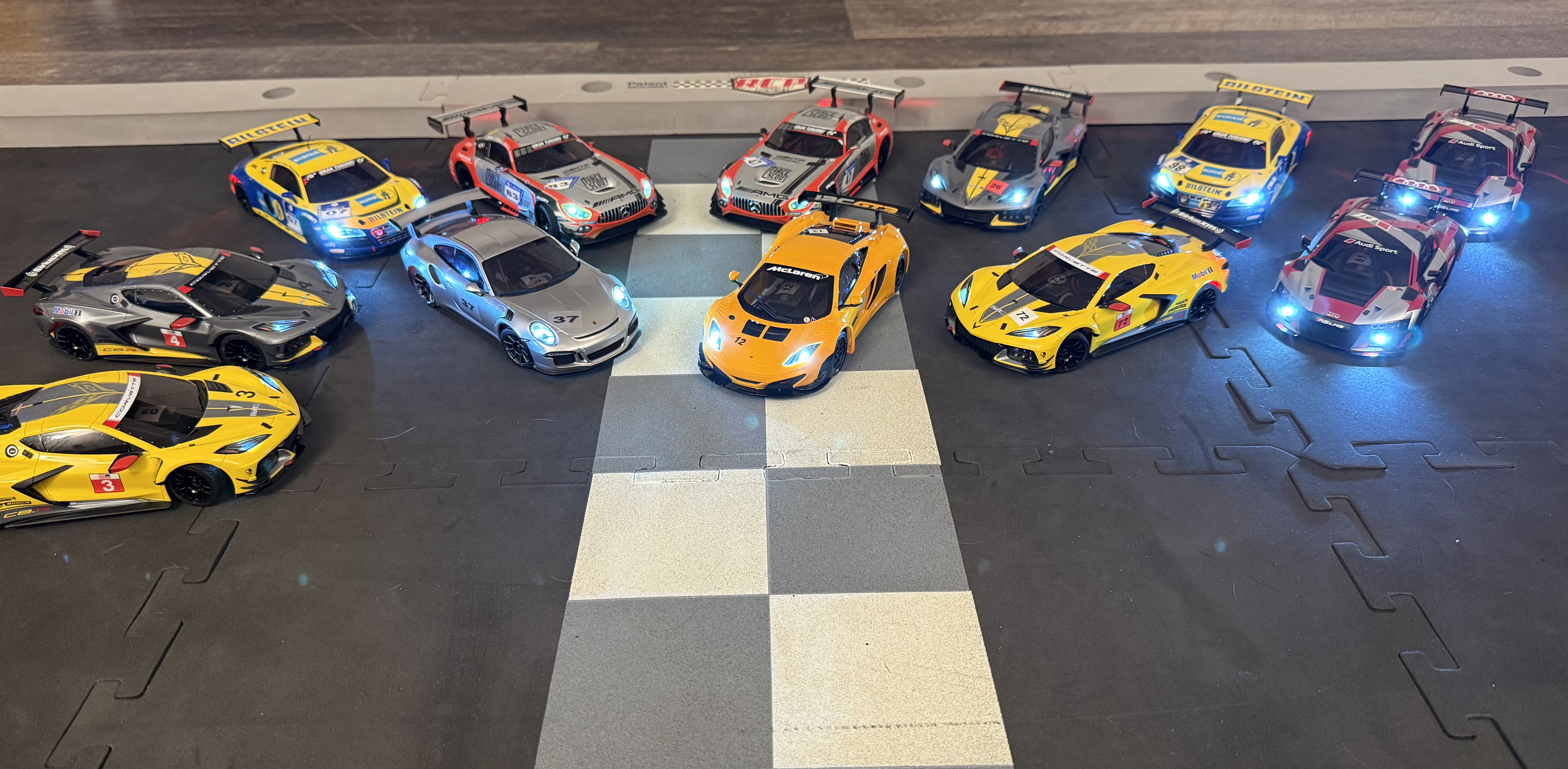 Mini-Z RC cars on the starting grid at a minilaps team building event